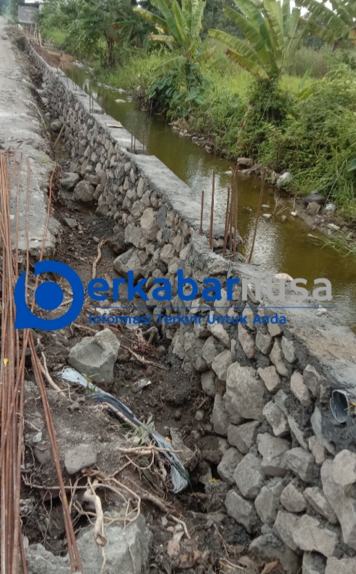 Peningkatan Jalan Masangan Wetan Suko Pekerjaan Belum Selesai Berpotensi Kerugian Negara.